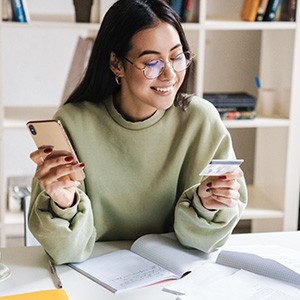 Woman using a credit card
